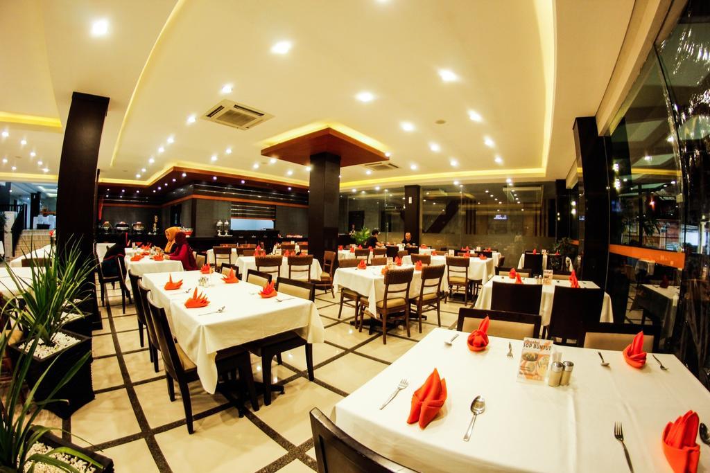 Alpha Hotel Пеканбару Екстер'єр фото